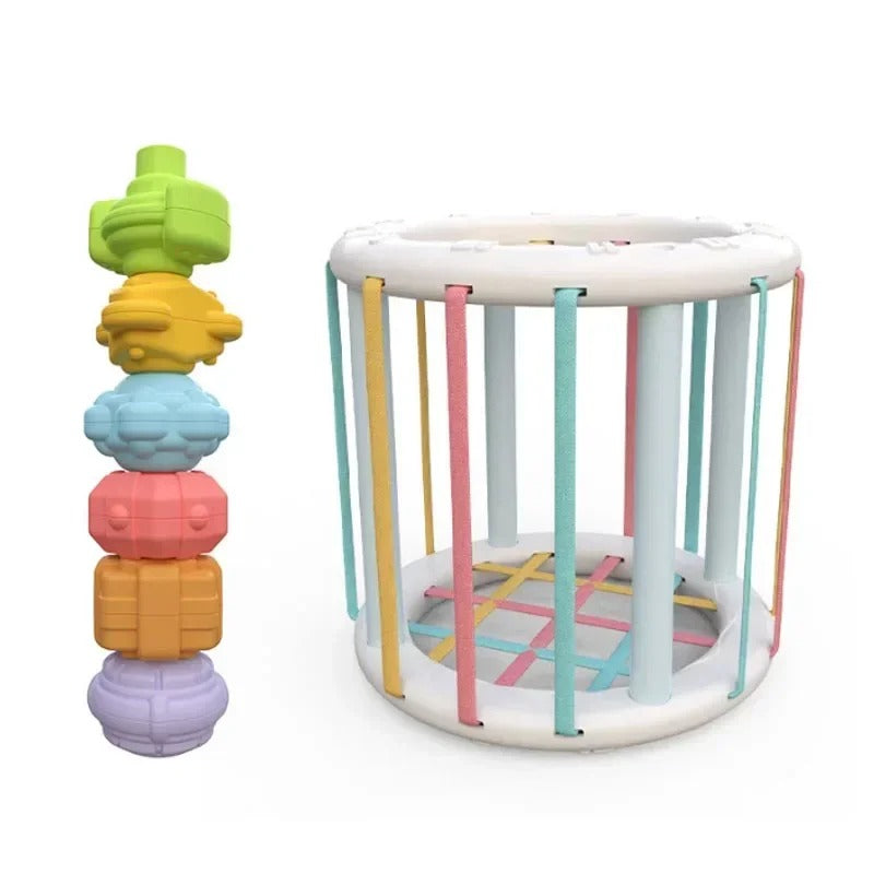 Jouet-bebe-6-mois-modele-cylindre-pastel